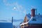 moonlit snowy rooftop with chimney and rising smoke silhouette