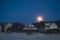 Moonrise above beach houses