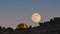 Moonrise above the tourist tent. Time-lapse.