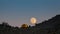 Moonrise above the tourist tent. Time-lapse.