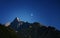 Moonrise over the Apuan Alps, as seen from Gragnola village, Lunigiana in north Tuscany. August 2019.