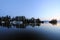 Moonrise over calm waters and boats in Princess Bay, Wallace Island, Gulf Islands, British Columbia