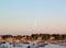 Moonrise over New England Harbor with Sailboats