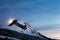 Moonrise over snowed mountain