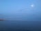 Moonrise during Sunset in Spring at Coney Island in Brooklyn, New York, NY.