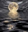 Moonrise on water surface