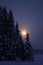 Moonrise at winter evening countryside