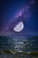 Moonset, moonrise over the ocean in the galaxy. Space dream image