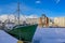 Moored boat surrounded by ice in Helsinki harbour