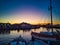 Moored boats in harbor at dawn