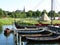 Moored Boats at the Pier and Roskilde City`s Famous Landmark St. Luke Cathedral, Roskilde