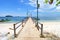 Moored boats at Tanjung Kelayang Beach on Belitung Island.