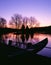 Moored Canoe by a Twilight Lake