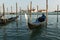 Moored gondola on a canal in Venice, Italy