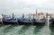 moored gondolas boats in Venice in Italy without people