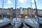 The moored luxury yachts in Old port Honfleur, France