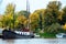 Moored mast ship on a canal in a city in the Netherlands