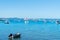 Moored pleasure boats in Pilot Bay with Sulphur Point container wharf in background