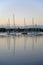 Moored sailboats off Coconut Grove in predawn light.