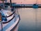 Moored sailing yacht hull and pier, dawn waterscape view