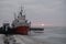 moored sea vessel near the pier in winter