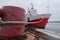 moored sea vessel near the pier in winter