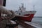 moored sea vessel near the pier in winter