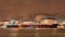 moored tanker at embankment of Illuminated petrochemical production plant, Port of Antwerp, Belgium