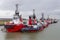 Moored tugboats in Dutch harbor Terneuzen near river Schelde