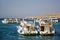 Moored white yachts waiting for tourists for sea trip. Vacation on Red Sea, resort, leisure, adventure, travel.