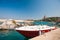 Moored yacht, motor boat. Red and white boat parked