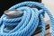 The mooring bollard and blue ropes