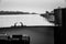 Mooring bollard on deck of a ship with a view of the landscape from the stern