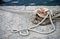 Mooring bollard with knotted nautical ropes