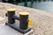 Mooring bollard on a wharf, to which a ship's rope may be secured