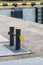 Mooring bollard on a wharf, to which a ship's rope may be secured