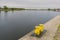 Mooring hook on wooden pier on the river