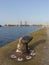 Mooring point at the port in the foreground and an industrial po