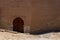 Moorish Islamic Arch above a wooden door in Granada, Spain, Euro