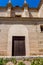 Moorish Islamic Arch above a wooden door in Granada, Spain, Euro