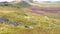 Moors with gritstone outcrops and swathes of heather.