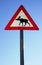 Moose crossing road sign