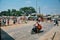 Moped crossing tracks in Myanmar.