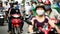 Moped Traffic in Downtown Ho Chi Minh City Daytime - Vietnam