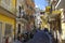 Mopeds parked in one of the side-street of famous Taormina town in August peak season of 2017er