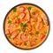 Moqueca with Fish and Shrimps in black bowl isolated on white. Brazilian sea food curry dish
