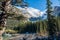 Moraine lake in autumn sunny day. Snow-capped mountains. Banff National Park, Alberta, Canada.