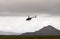 MORDALUR, ICELAND - AUGUST 31, 2015: Helicopter for medical help at remote Mordalur farm