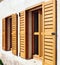 A more beautiful looking home with wooden window design