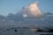 Morgan Bay beach at sundown, Wild Coast, Eastern Cape, South Africa. The clouds are reflected in the water on the beach.